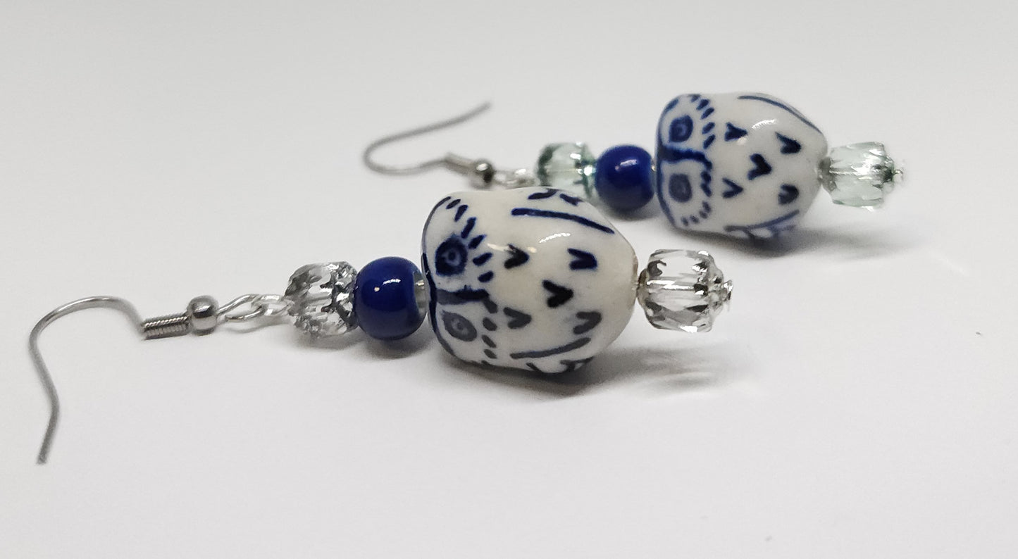 Ceramic owls with stainless steel hooks