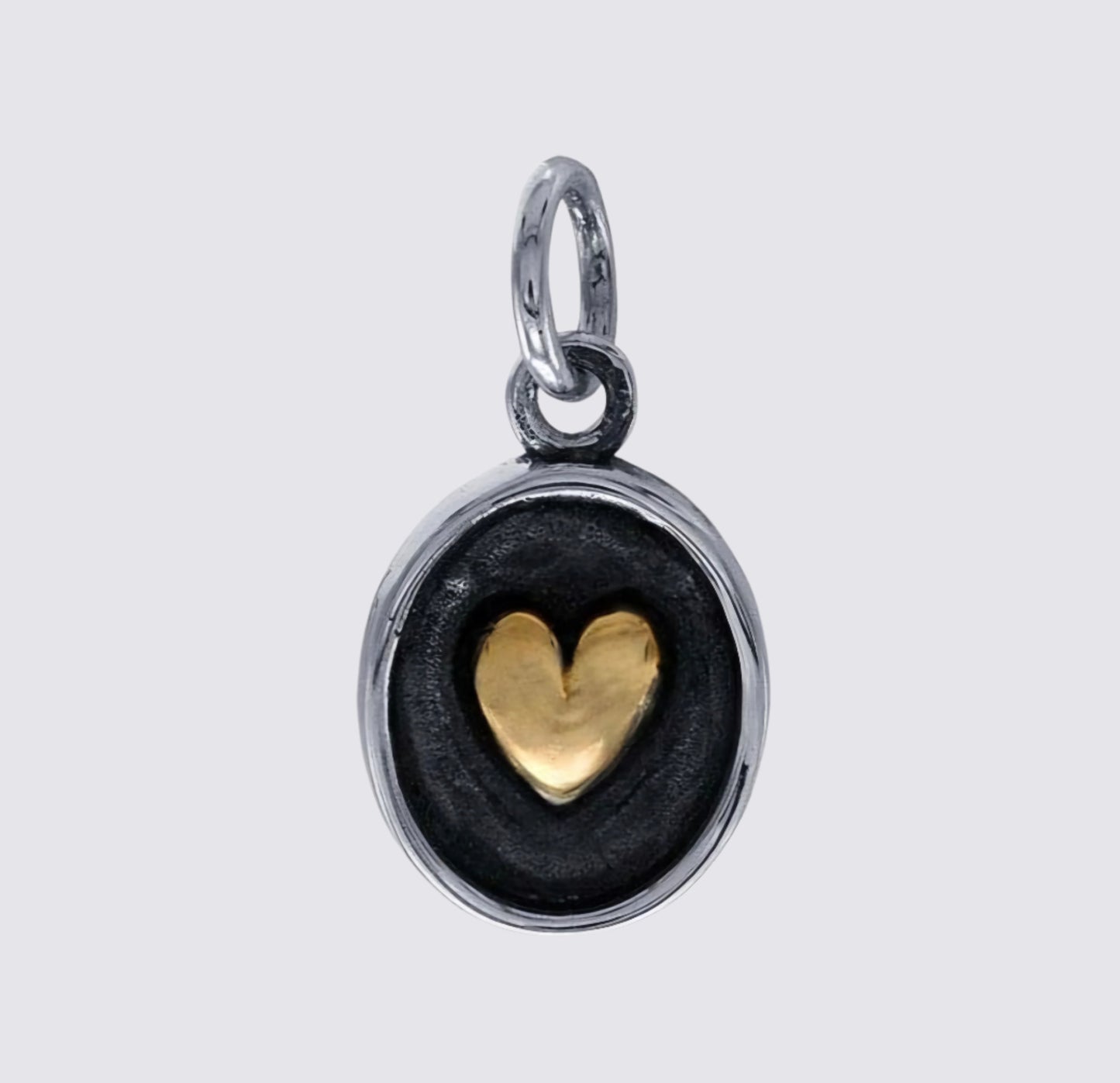 Sterling Silver Oval with Bronze Heart