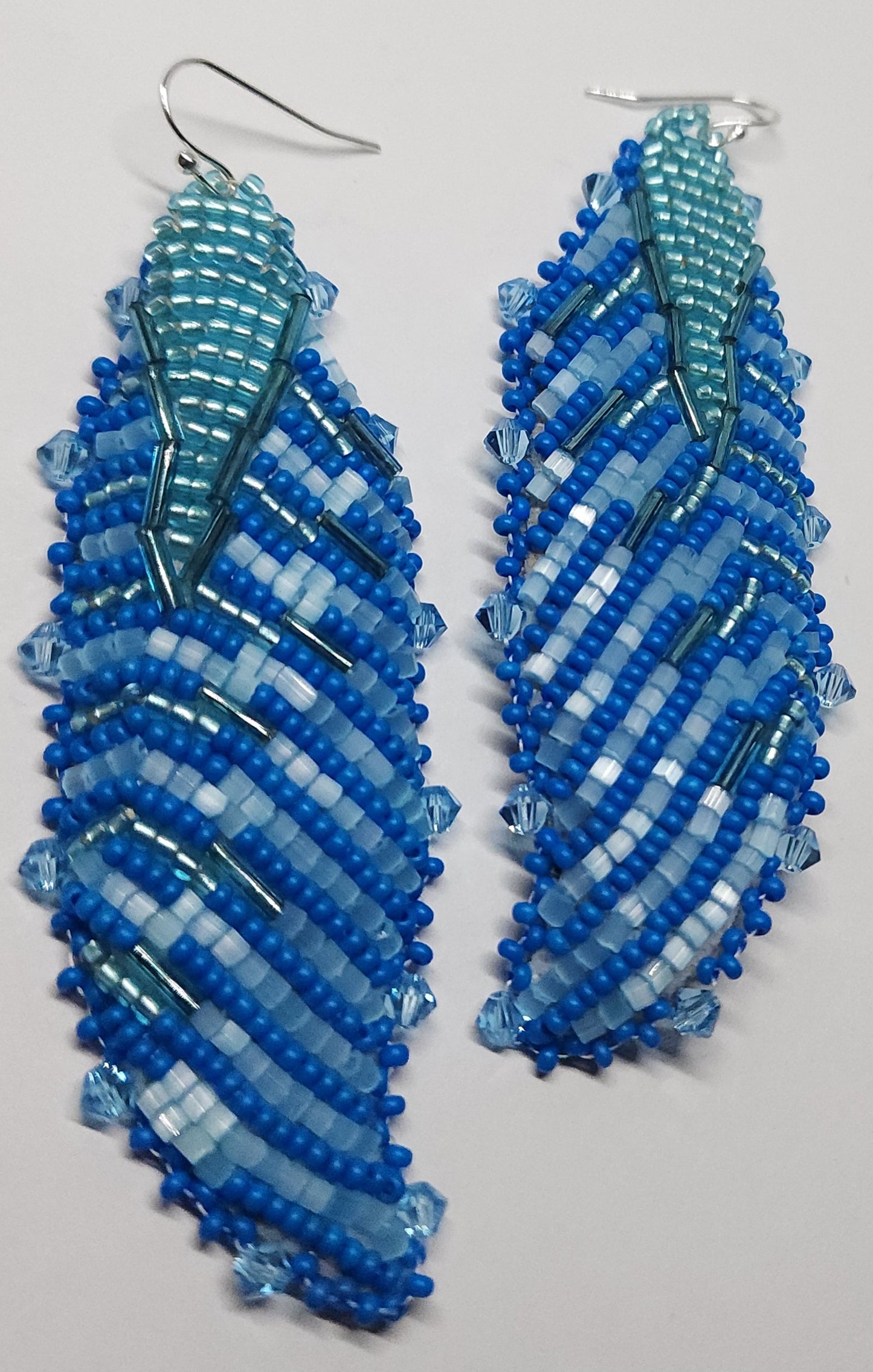 Blue feather earrings