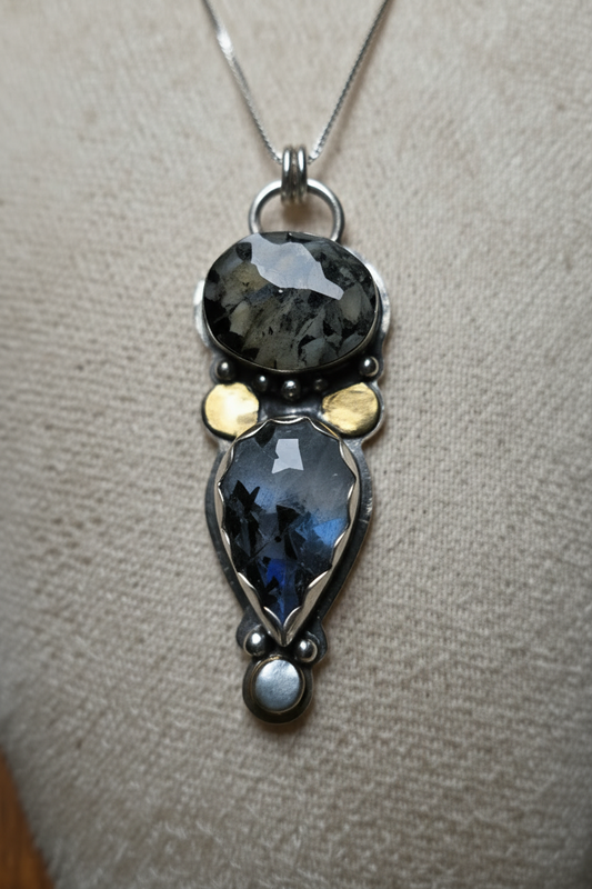 Jewelry pendant with stones on a neutral background