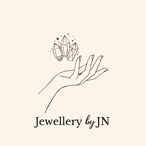 Logo of 'Jewellery by JN' featuring a hand holding crystals on a beige background.