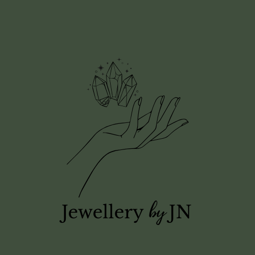 Logo of 'Jewellery by JN' featuring a hand holding crystals on a beige background.