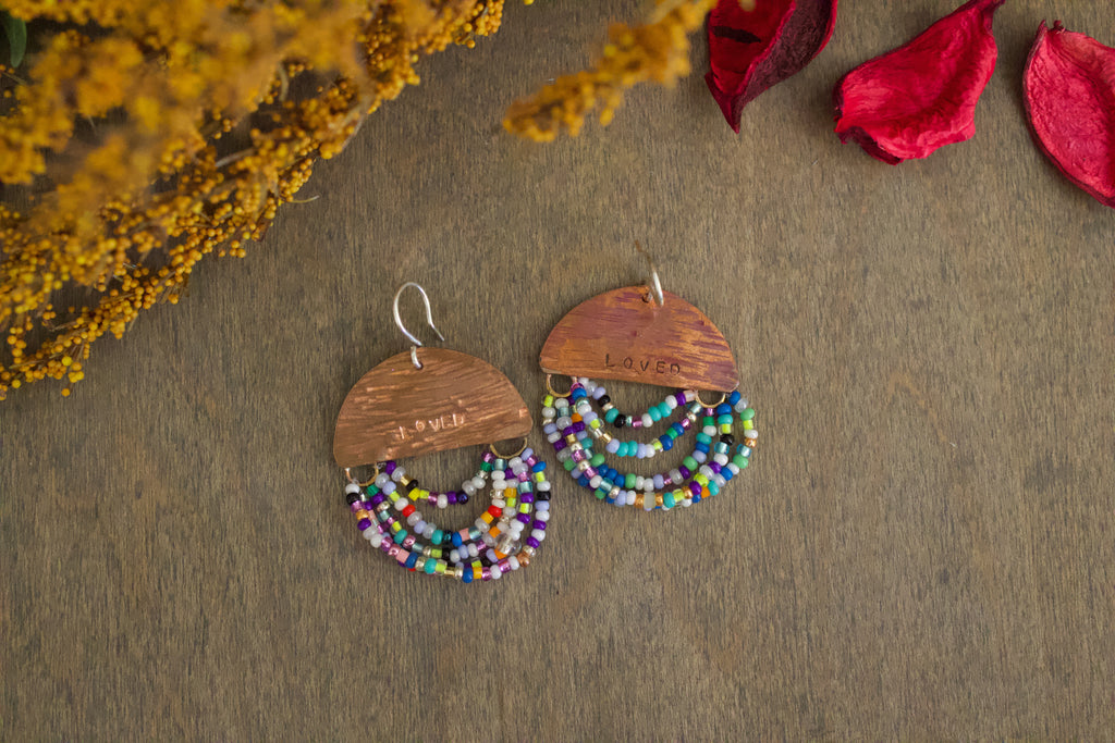 Close-up of Mini Wordkeeper Earrings Loved by Jewellery by JN, highlighting hammered copper, bead soup beadwork, and hand-stamped affirmations.