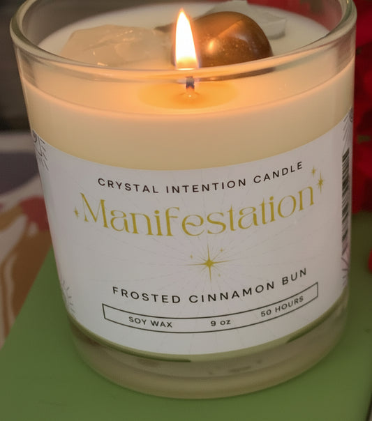 Manifestation Intention Candle by Jewellery by JN, hand-poured, Frosted Cinnamon Bun, clear quartz, Tiger’s Eye, sage, silver and gold glitter
