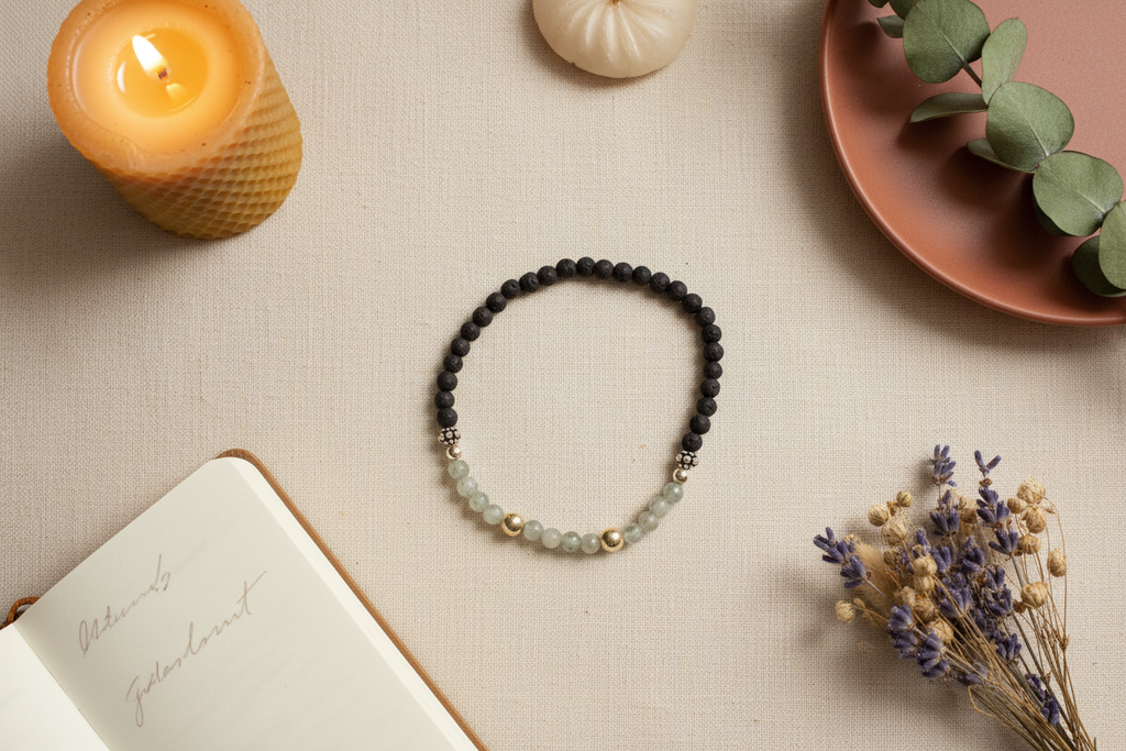 Shadowseer Bracelet by Jewellery by JN, featuring labradorite, volcanic rock, and sterling silver beads, arranged in a flat lay on a neutral background.