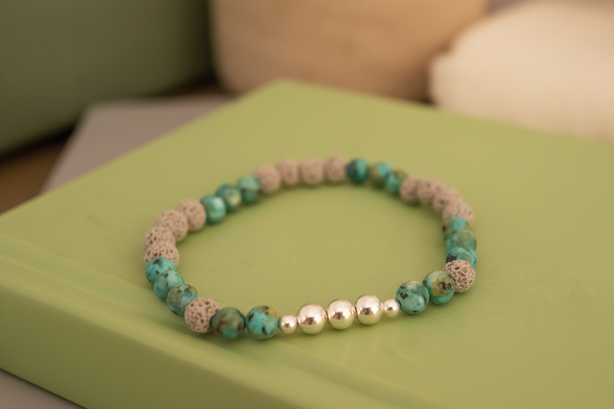 Close-up of Wayfinder Bracelet by Jewellery by JN, highlighting the African turquoise, grey lava rock, and sterling silver bead details."