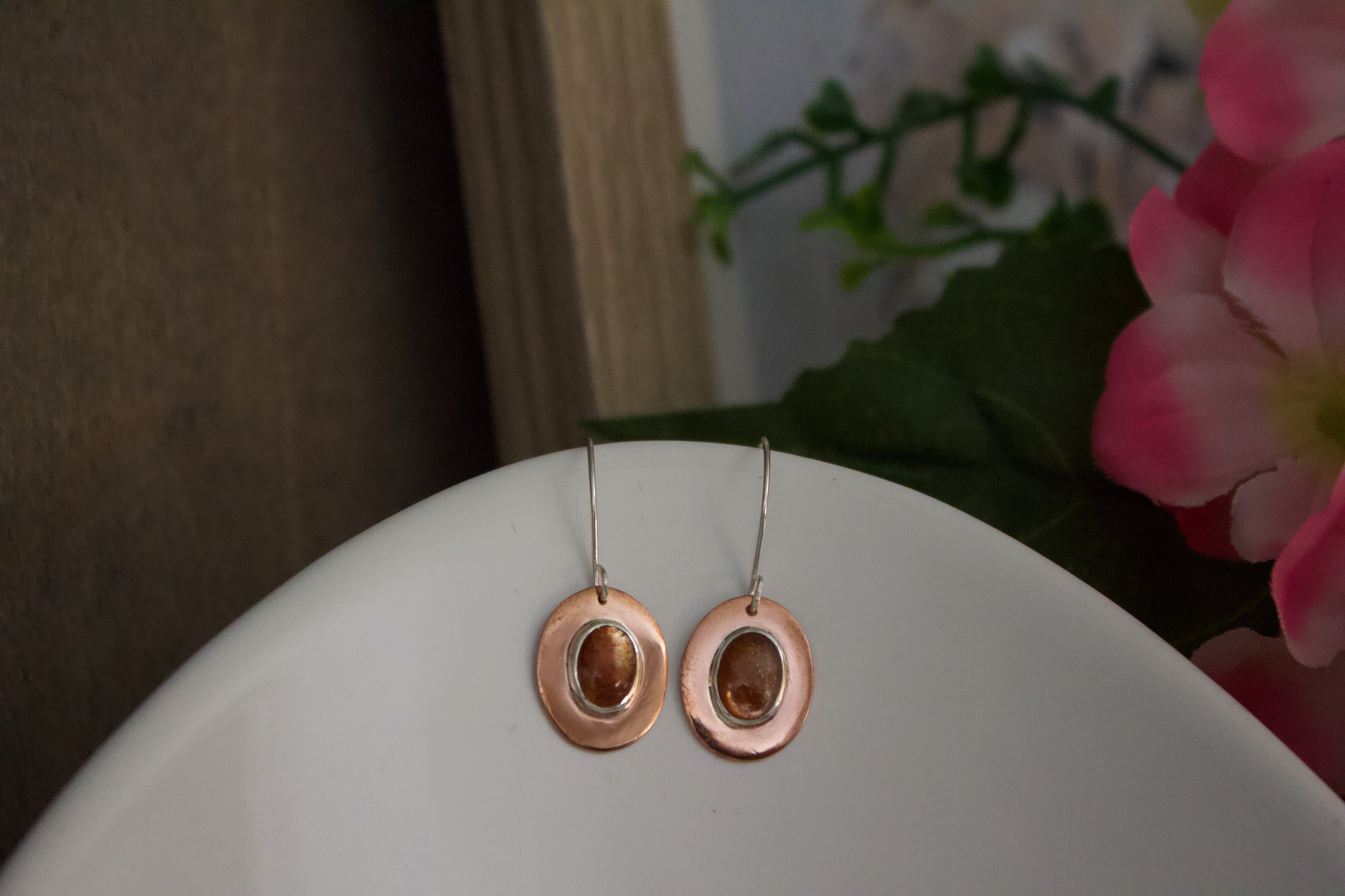 Solar Ember Earrings by Jewellery by JN – one-of-a-kind AAA peach sunstone, hand-forged copper, fine silver bezel, sterling silver ear wires