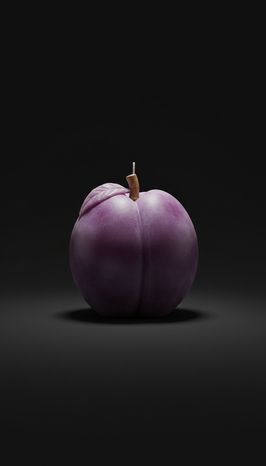 Sculptural plum pillar candle