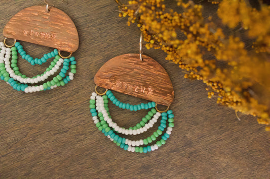 Mini Wordkeeper Earrings Worthy by Jewellery by JN, hand-forged copper, green teal and white bead fringe, single WORTHY affirmation, sterling silver hooks
