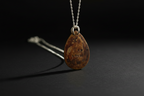 Reverse of Emberheart Pendant by Jewellery by JN, copper backplate hand-stamped with 'I AM LOVED.